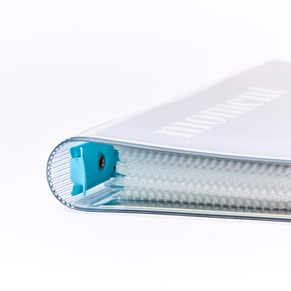 MOMENT A5 K-pop photocard binder open with 4-pocket pages holding sleeved photocards