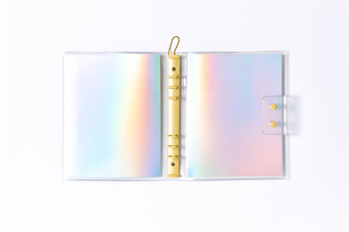 Open MOMENT A5 K-pop photocard binder with holographic cover and 6-ring mechanism